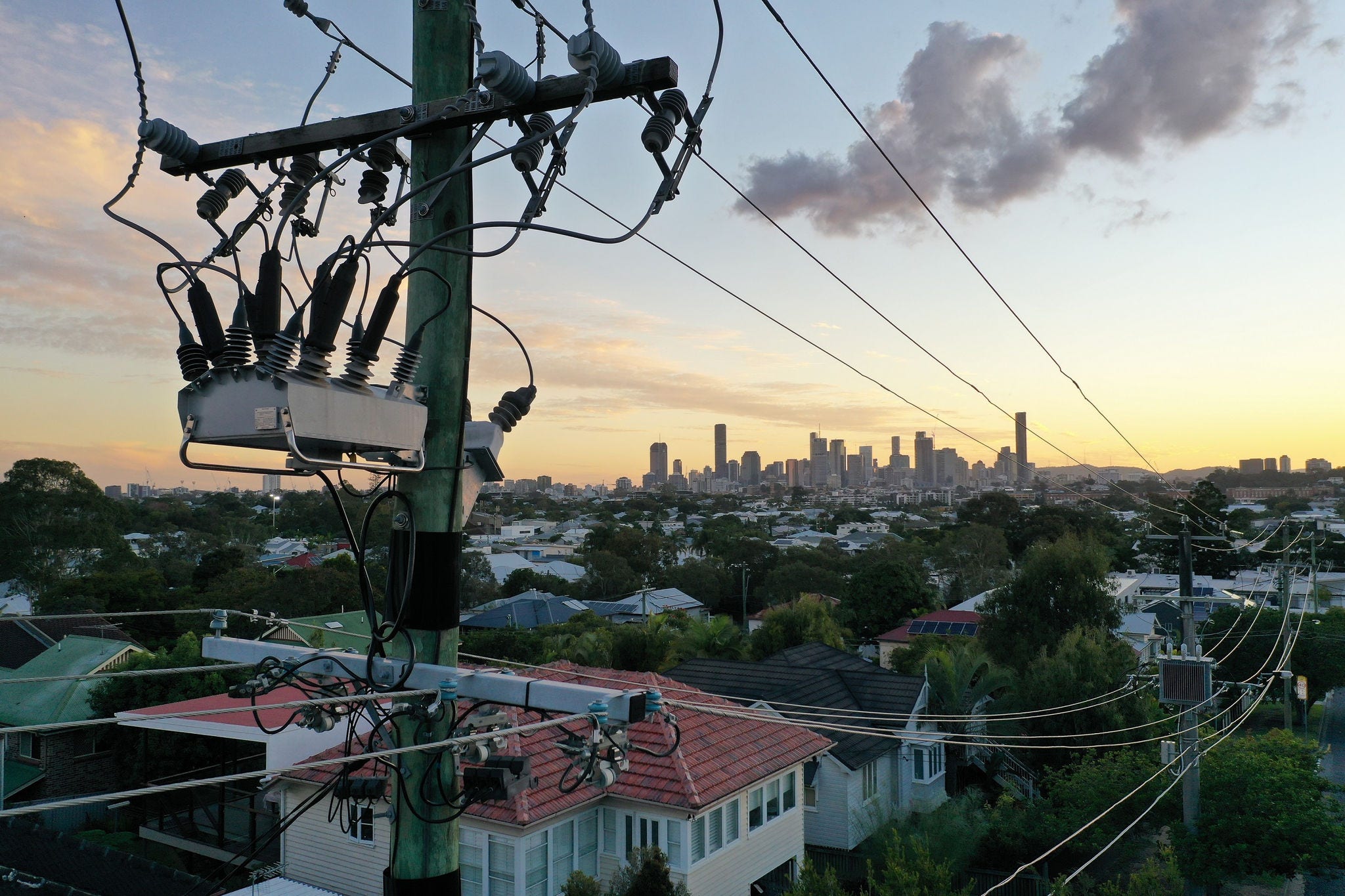 power lines and a power box on a telegraph pole