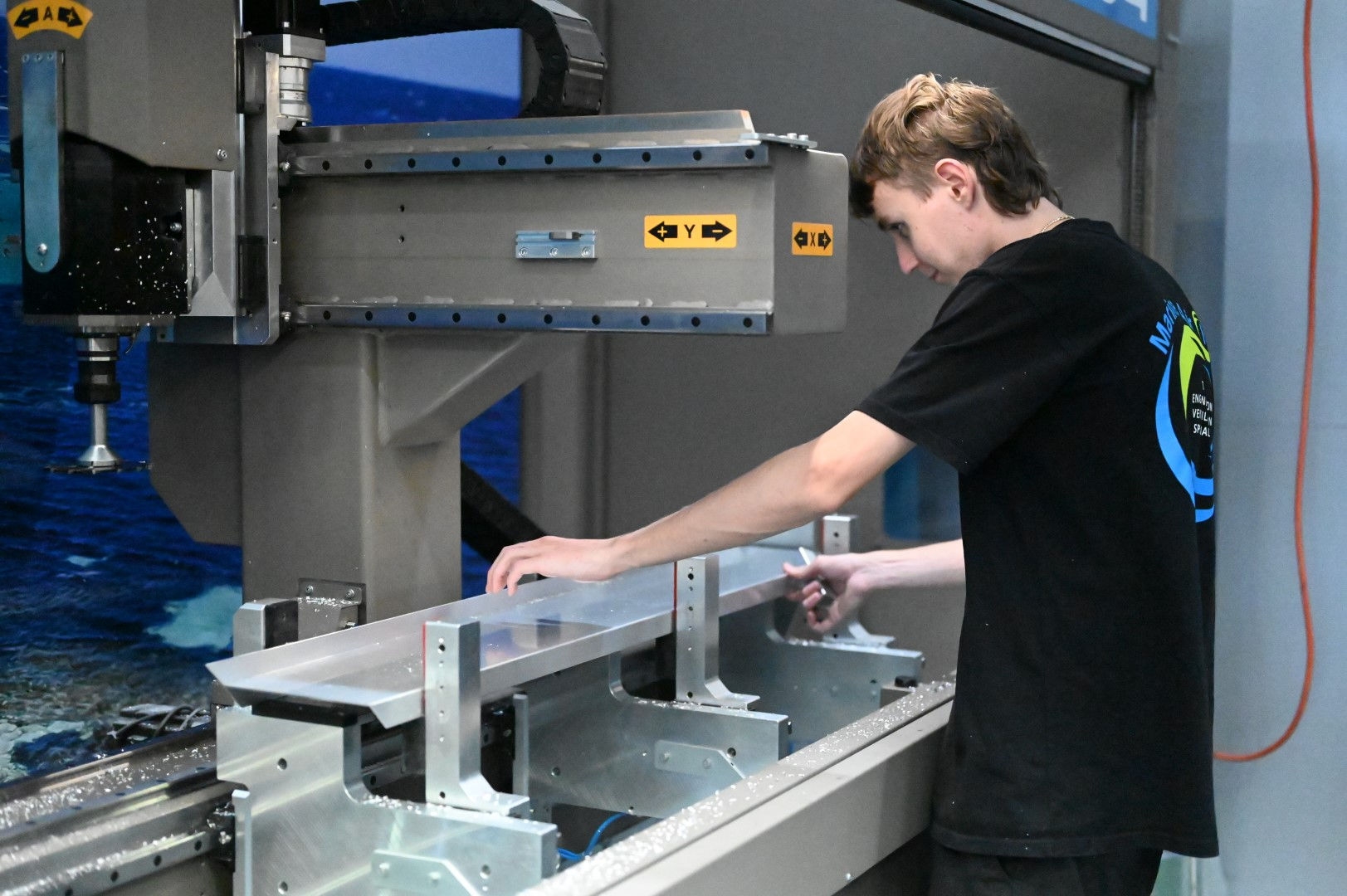 person working on lab machinery 