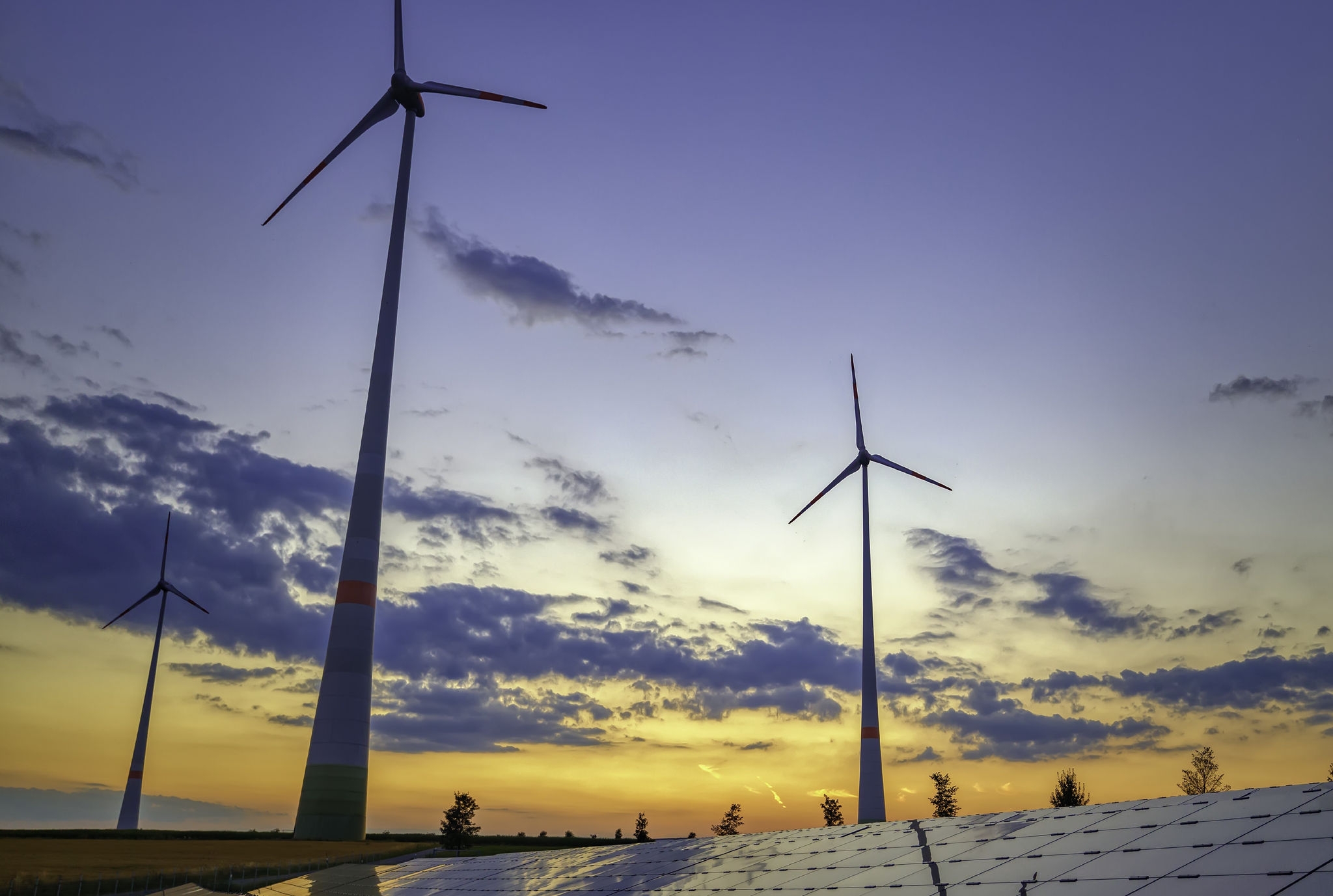 wind turbines and clouds in the sky